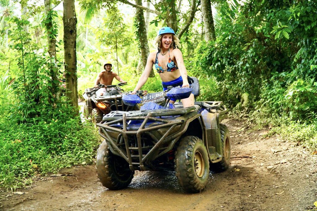 Beautifull Women riding ATV with bali adventure trips Beautifull Women riding ATV with bali adventure trips
